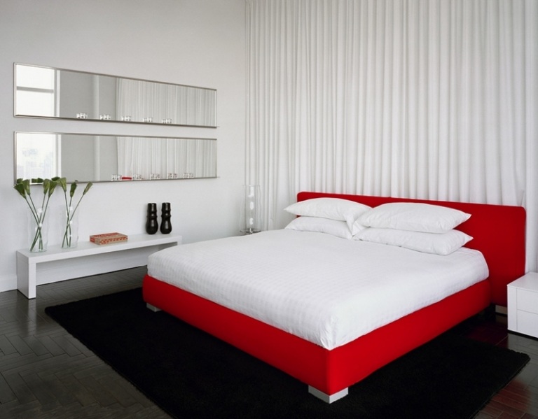 Schlafzimmer-Rot-Weiss-Bettrahmen-puristische-Einrichtung