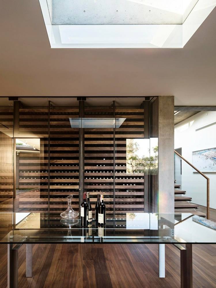 beton haus glas tisch weinkeller wand modern treppe holzfussboden