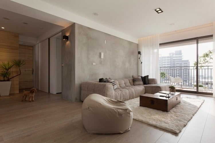 feng-shui-wohnzimmer-einrichten-modern-beige-braun-erdtoene-teppich-kuschelig-sitzsack