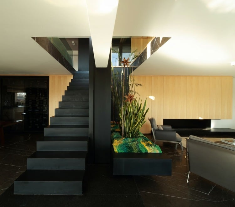 fussboden aus schwarzem marmor pflanzen interieur garten idee