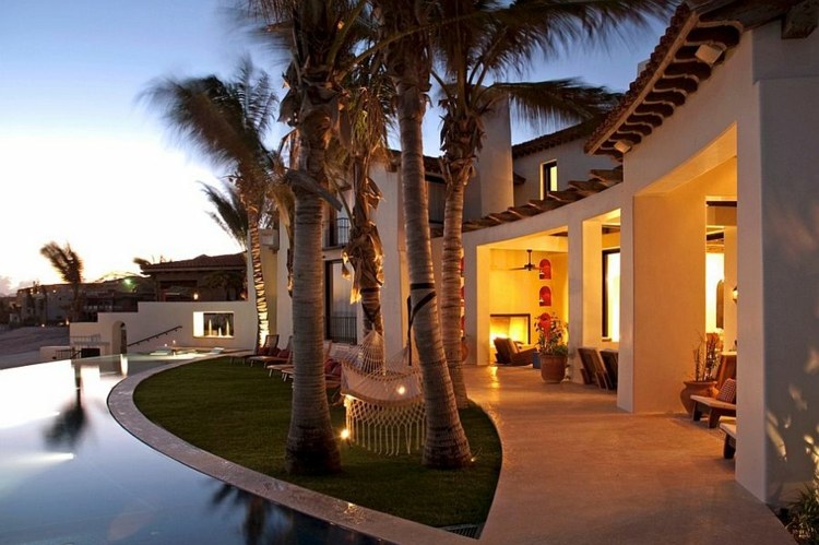haengematte outdoor bereich mediterran modern palmen pool terrasse