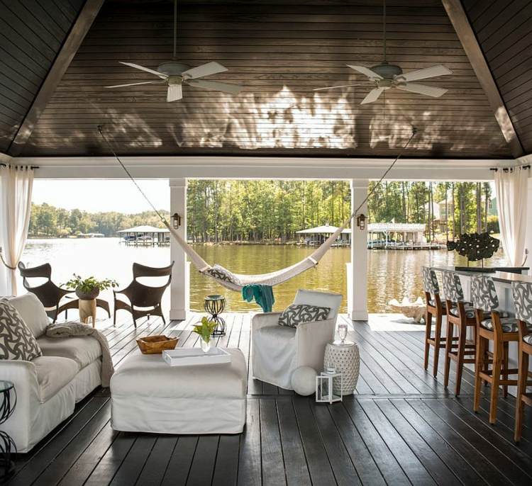 haengematte outdoor bereich terrasse ueberdachung weiss einrichtung couch bar