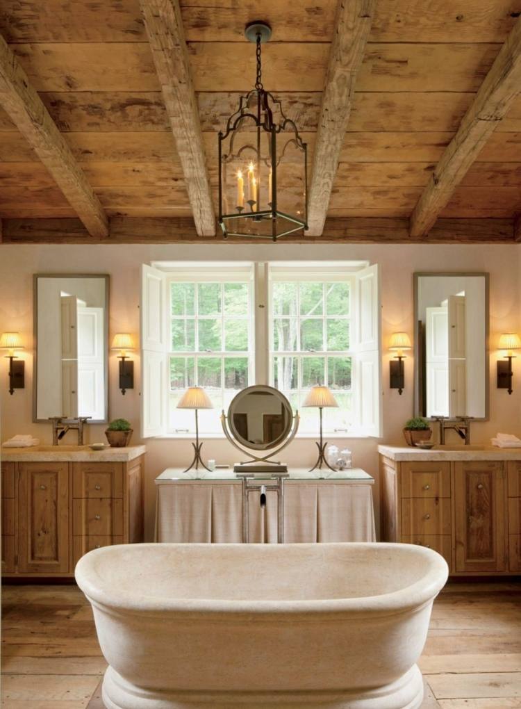 landhausstil rustikal badewanne stein decke balken badschraenke kronleuchter