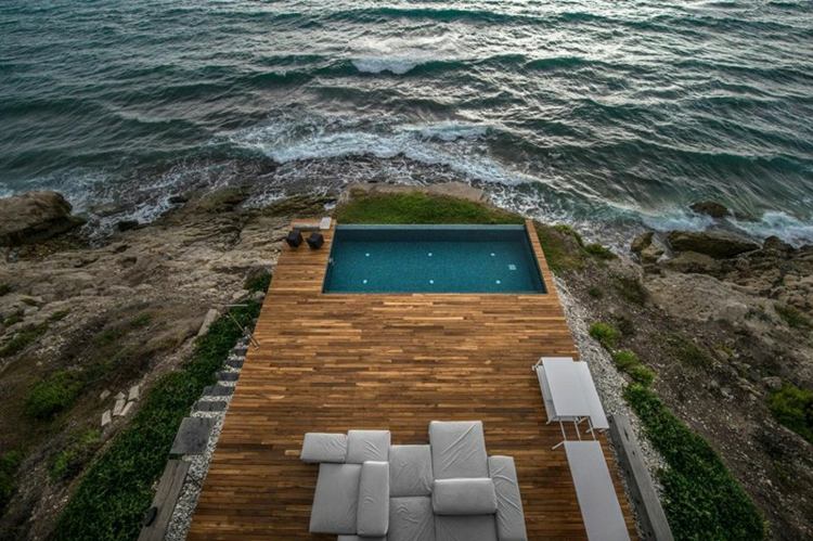 mediterranen stil strandhaus parkett pool infinity meer strand lounge