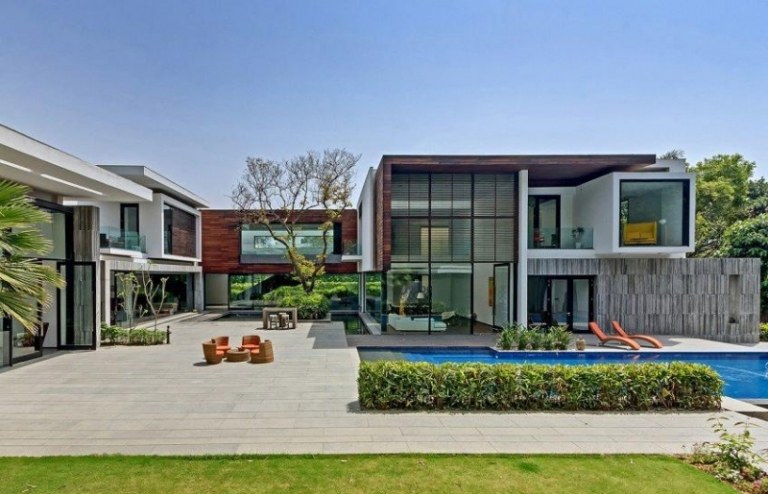 moderne Terrassengestaltung Einfamilienhaus-Pool-Garten-Rasen