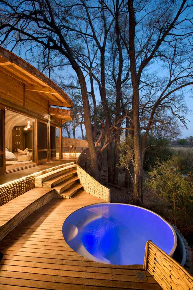 treibholz terrasse pool safari ferienhaus luxus baum