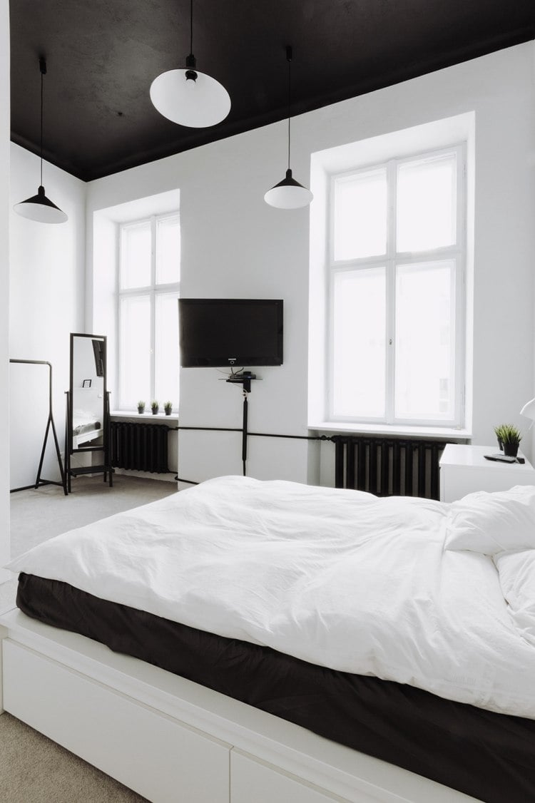 weiße-schlafzimmermoebel-stil-gestaltung-industriedesign-schwarz-decke-lampen-heizungskoerper