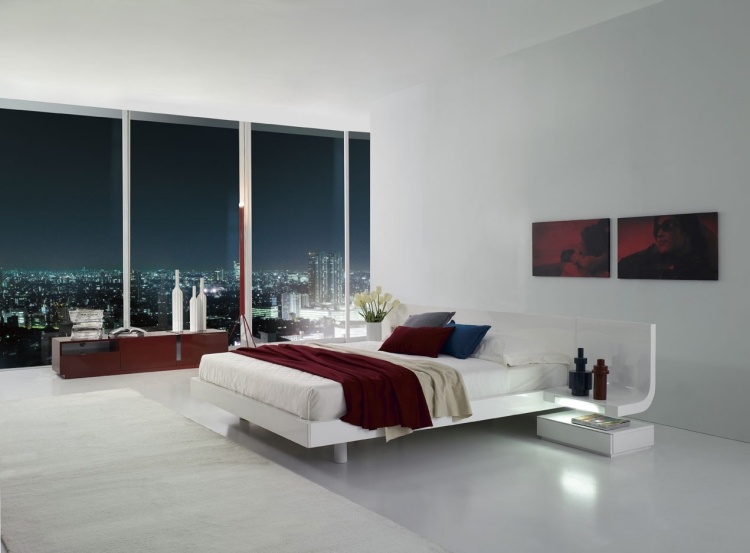 Weiße Schlafzimmermöbel -stil-gestaltung-minimalistisch-rot-details-fenster-stadt-abend-aussicht