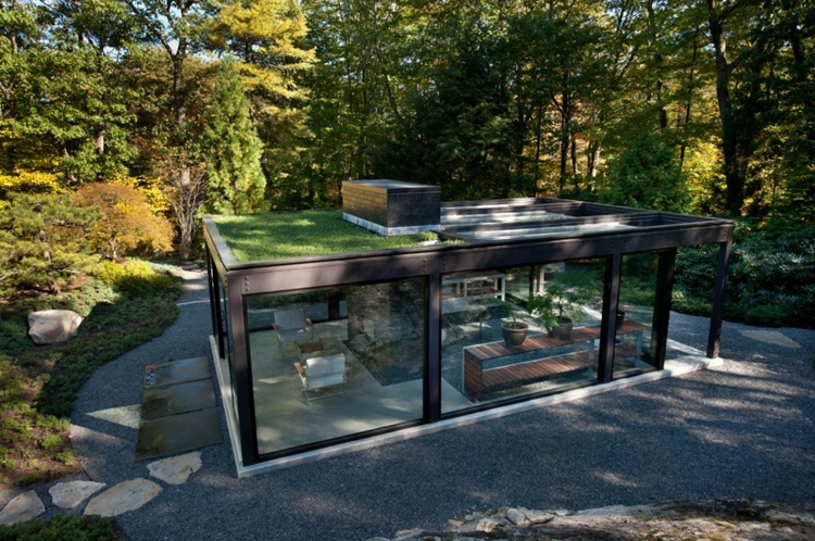 wintergarten design mit teestube kieselsteine grau rasen dach glas