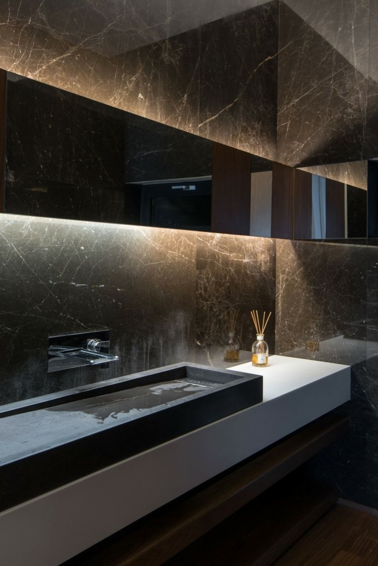 wohnung mit schwarz grauem wohnzimmer bad marmor edel waschbecken modern design