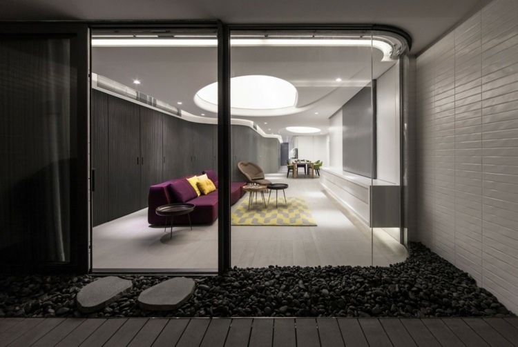 decken design beleuchtung wohnzimmer teppich grau gelb terrasse kieselsteine