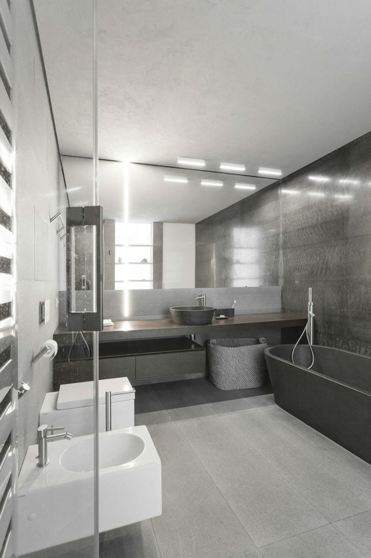 einrichten 1 zimmer wohnung grau badezimmer inneneinrichtung badewanne schwarz