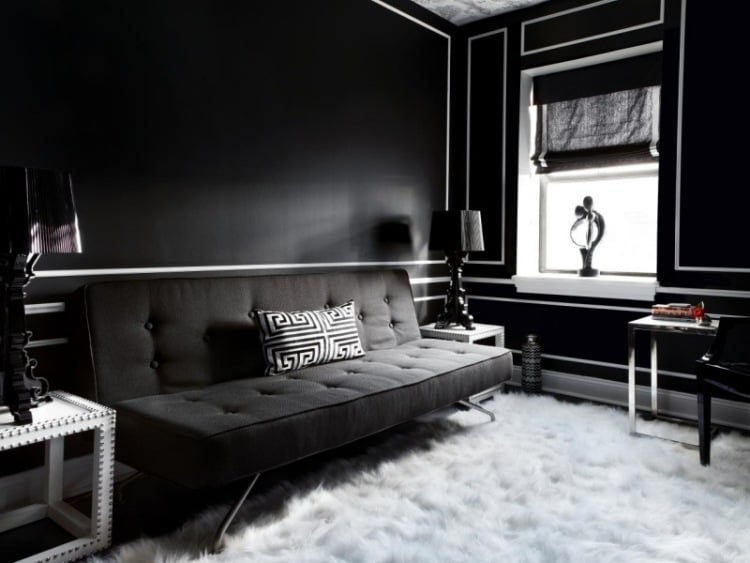 einrichtungsideen-wohnzimmer-schwarz-weiss-fellteppich-dunkel-couch-modern-figuren