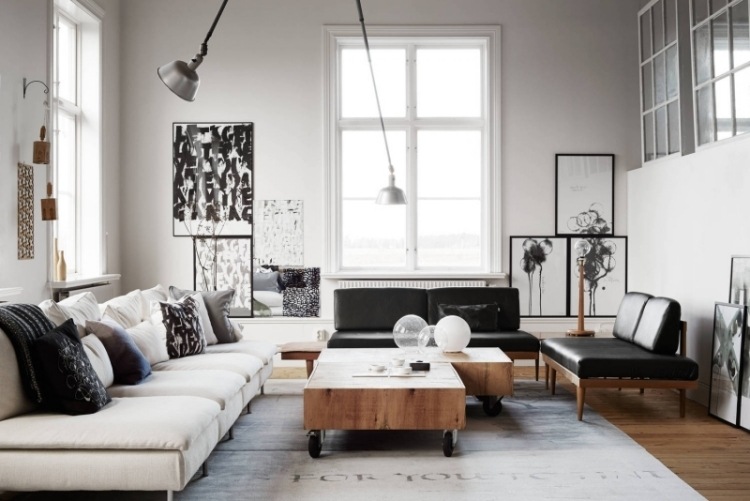 einrichtungsideen-wohnzimmer-schwarz-weiss-loft-couches-leder-holz-couchtische-lampen-bilder-modern-kusnt-prints-modern-sprossenfenster
