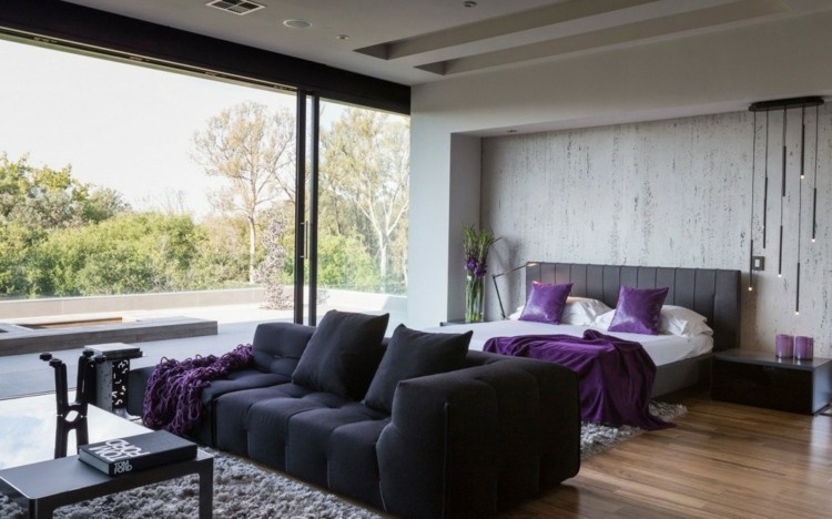 haus natuerlichen materialien schlafzimmer bett couch schwarz teppich