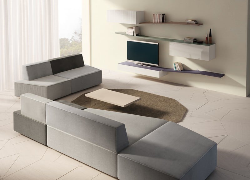 Sofa-Grau-modern-gestalten-Medienwand-Regale-Lila-Gruen-Rosa