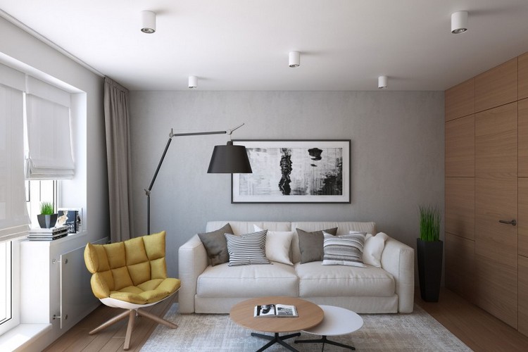 Einrichtung in Naturtönen wohnzimmer-steingraue-wandfarbe-holz-bodenbelag-creme-2-er-sofa
