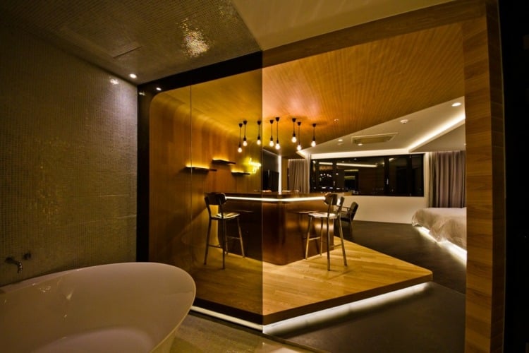 hotelzimmer design indirekter beleuchtung badewanne mosaik fliesen interieur modern