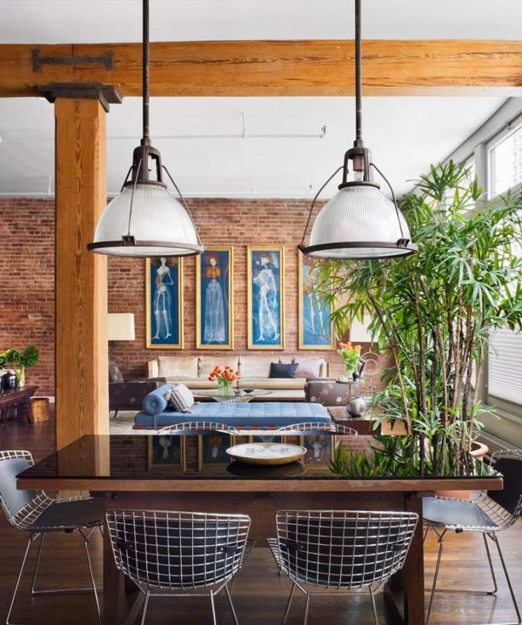 industrial-design-moebel-backsteinwand-pendelleuchten-esstisch-diamond-chair-bambus-pflanze