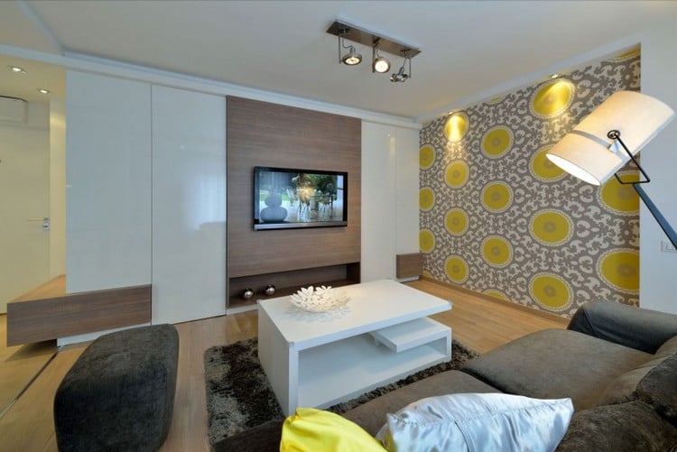 moderne Einrichtungsideen wohnzimmer-wohnwand-holz-hochglanz-weiss-gelbe-tapete