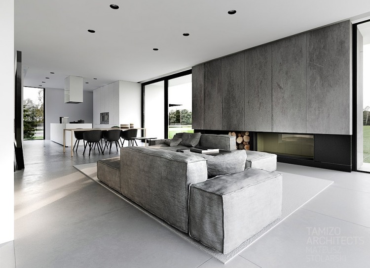 moderne-innenarchitektur-minimalistisch-beton-couch-modulare-offener-kamin-esstisch-kueche-pabianice-tamizo
