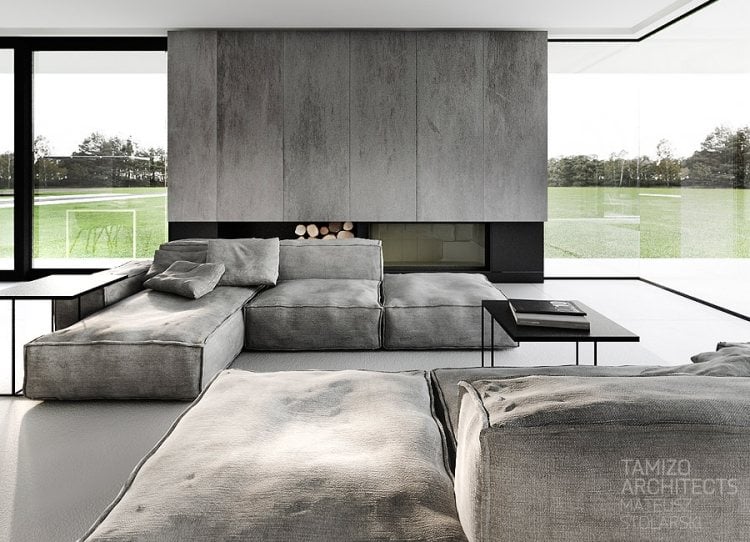 moderne Innenarchitektur -minimalistisch-betonwand-modulare-couch-offener-kamin-pabianice-tamizo