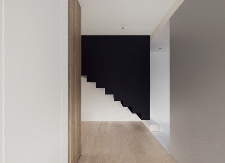 moderne-innenarchitektur-minimalistisch-treppe-holzboden-schwarz-weiss-waende-warschau-tamizo