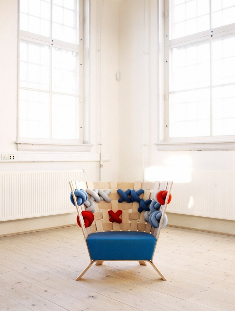 sofa sessel design polster dunkelblau lounge einrichtung fenster weiss wand