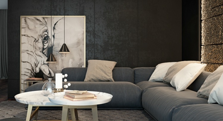 stilvolle luxurioese interieure sofa komfort grau dekokissen weiss couchtisch