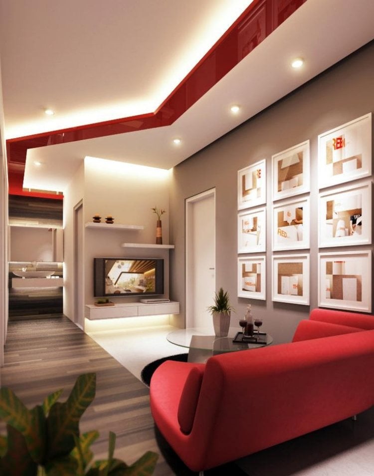 wandfarbe-sand-rot-couch-indirekte-beleuchtung-bilder-wand-glas-couchtisch