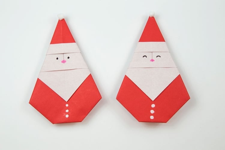 Origami falten zu Weihnachten Santa Klaus Figur aus Papier mit den Kindern basteln