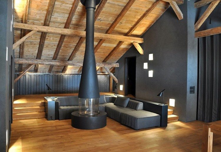Wohnzimmer-Grau-skandinavischer-Kamin-Holzboden-Ideen