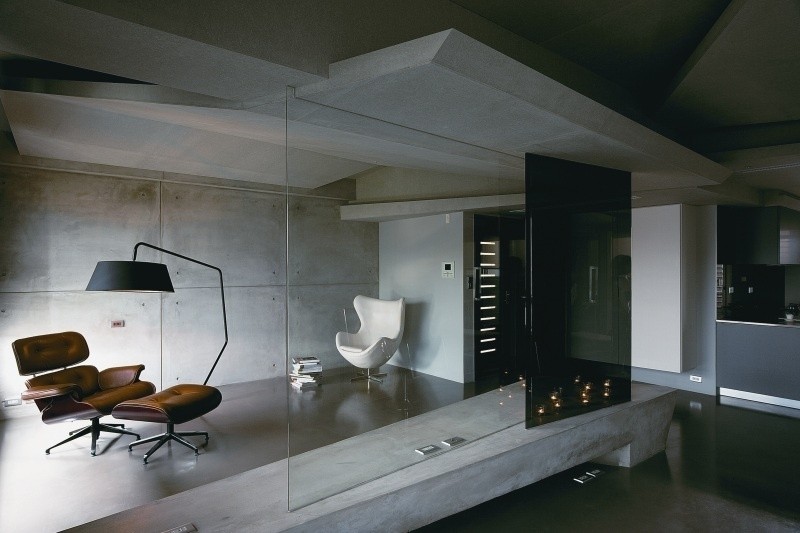 beton-design-modern-raumteiler-glaswand-sessel-leseecke-eames-lounge-chair-egg-schwarz-grau