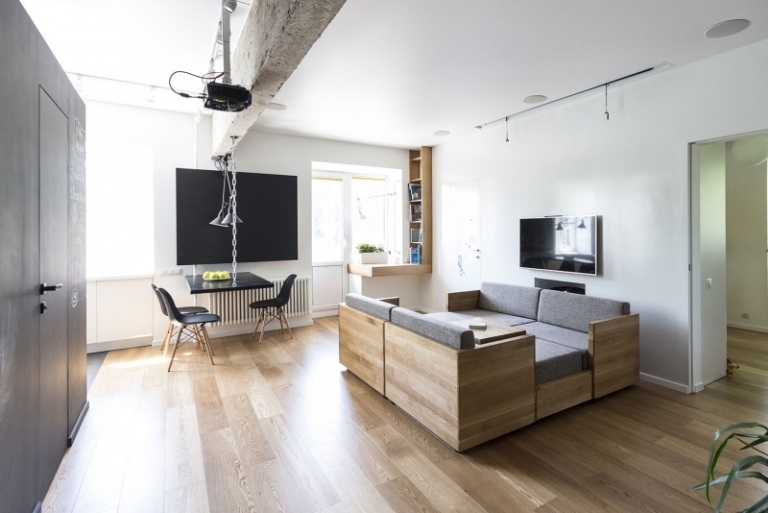 indoor-spielplatz-zuhause-wohnzimmer-modulare-couch-funktionen-zusammen-graues-polster