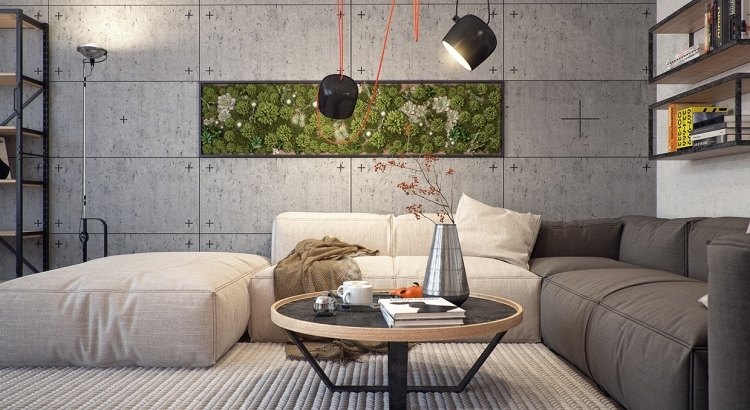 vertikaler-garten-wohnzimmer-industrial-stil-couches-grau-module-couchtisch-rund-strahler-betonwand