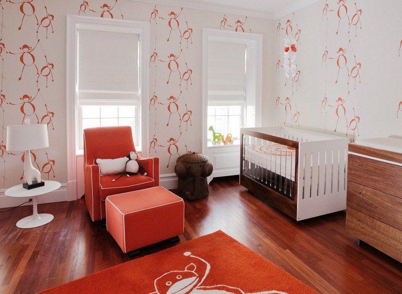 Babyzimmer-einrichten-Ideen-Maedchen-orange-Sessel-Affen-Tapeten