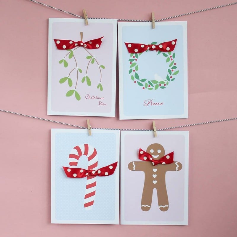 Weihnachtskarten-selber-basteln-Weihnachtsmotive-ausdruecken-Schleife-verzieren