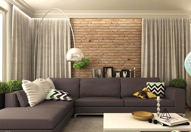 modernes-wohnzimmer-ecksofa-wandgestaltung-ziegeloptik-graue-vorhaenge-stehleuchte