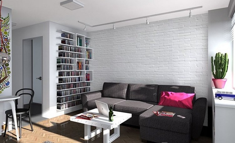 modernes-wohnzimmer-sofa-anthrazit-weisse-ziegelwand-parkettboden