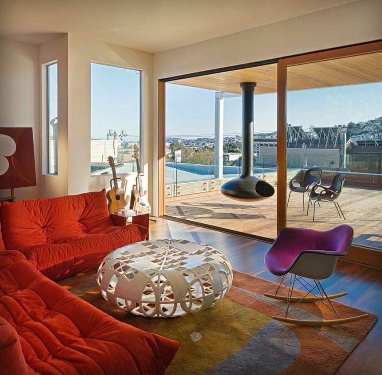 teppiche wohnzimmer rot sofa modern abstrakt couchtisch bunte farben