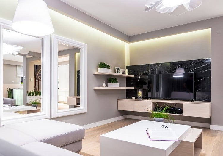 Wandgestaltung im Wohnzimmer farbe-grau-seidengrau-indirekte-led-beleuchtung