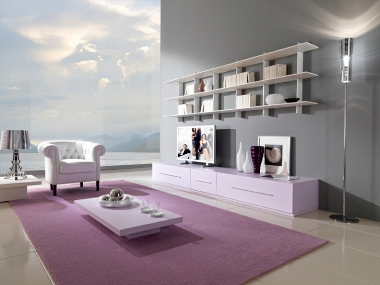 wohnzimmer dekorieren rosa teppich gross wohnwand regal lowboard weiss