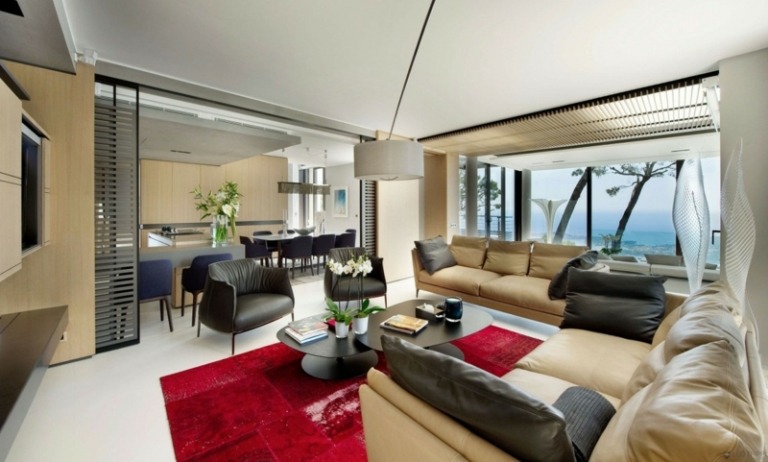 wohnzimmer dekorieren rot akzent teppich innendesign modern gestaltung