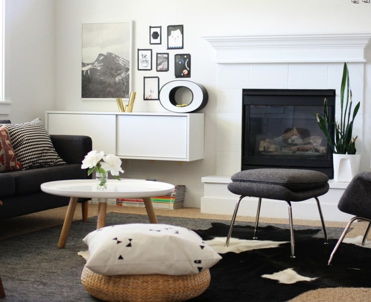 dekorieren sideboard wohnzimmer modern schwarz weiss wandbilder kamin