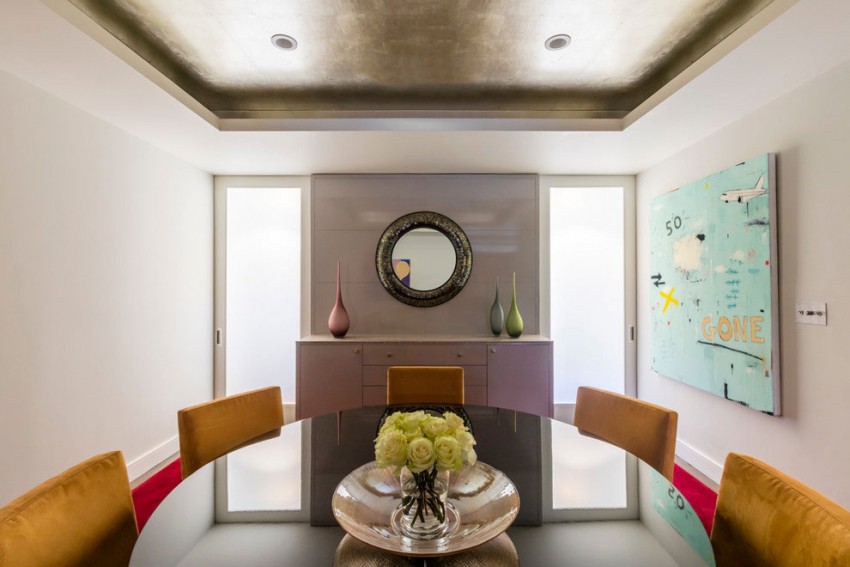 farbgestaltung-ideen-nyc-appartement--esszimmer-teppichboden-grau-decke-silber-polsterstuehle-ockerfarbe