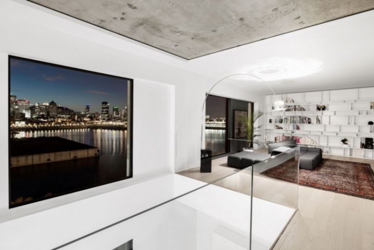 raumgestaltung-ideen-betondecke-modern-minimalistisch-orientteppich-glasgelaender