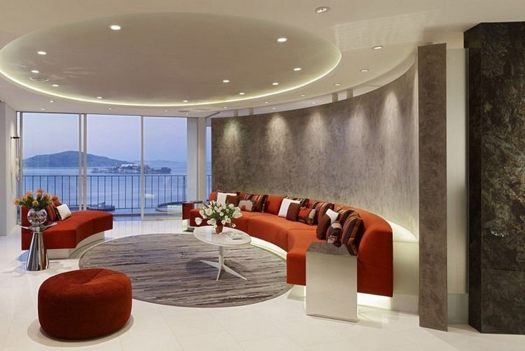 runde-sofas-modern-orange-gestell-hinterbeleuchtet-runder-teppich