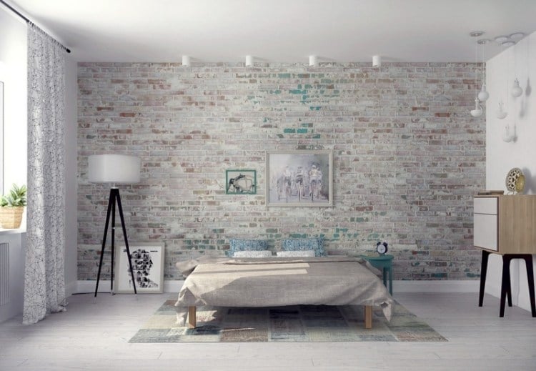 schlafzimmer-einrichten-inspirationen-bett-grau-backsteinwand-minimalistisch-weiss