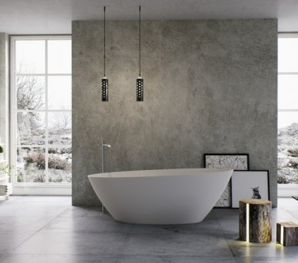 badewanne luxus schraeg design beton wand idee schaukelstuhl