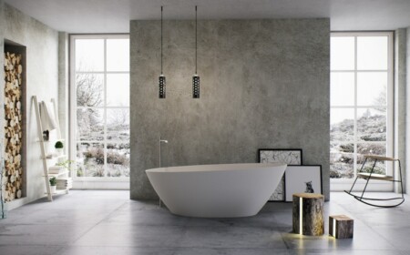 badewanne luxus schraeg design beton wand idee schaukelstuhl